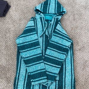 Teal drug rug jacket